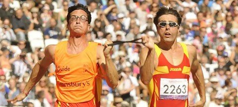 Image of Xavi and Enric in full 100 meter dash